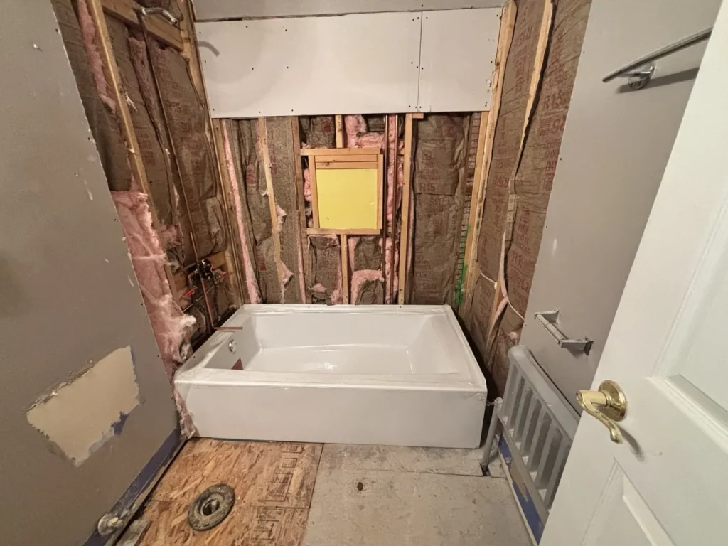 Bathroom opened to the studs with a new tub set after a water leak – Denver, CO